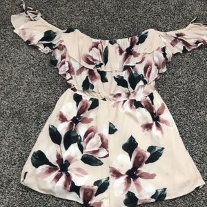 Cream romper with flower detail